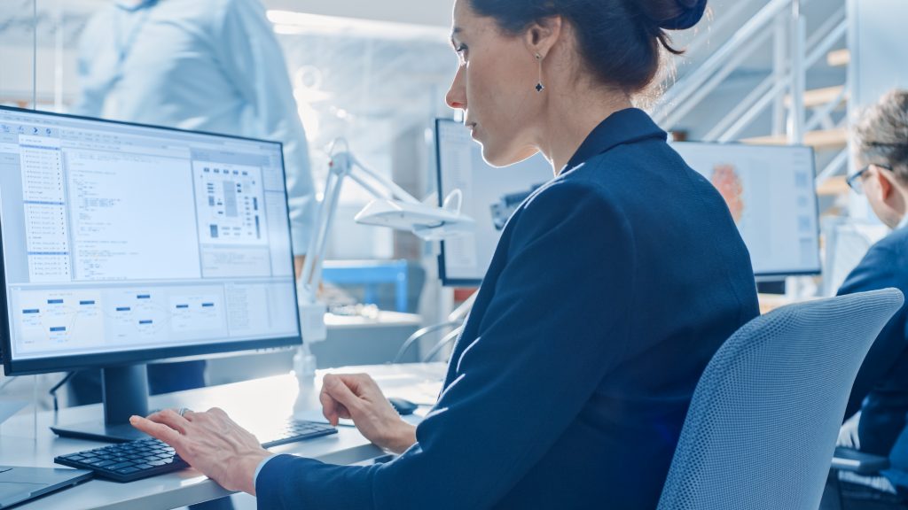 Back view of operator using software